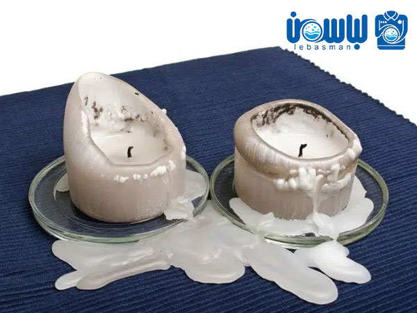 بهترین ترفندهای پاک کردن شمع از روی لباس